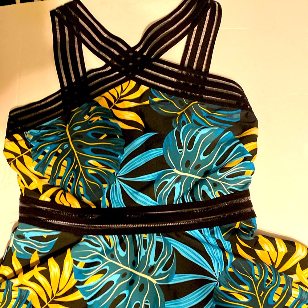 Women’s bathing suit. Size medium high waisted tropical print.